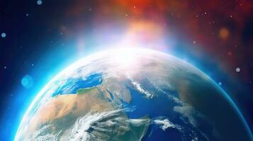 View of the planet earth from space during a sunrise photo