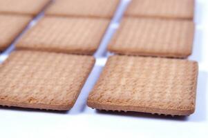 a pile of biscuits on a white background photo