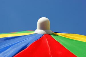 a close up of a colorful umbrella photo