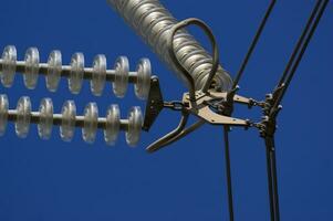 a close up of a power line with wires attached photo