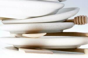 a stack of plates and forks photo