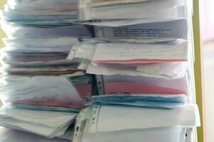 a stack of papers photo