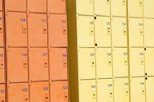 a row of yellow and orange lockers photo