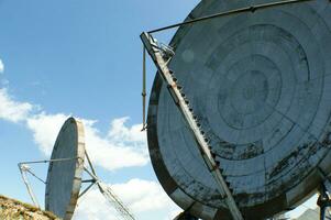 old and large disused radio antennas photo