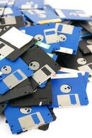 a pile of floppy disks photo