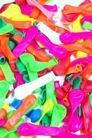 a pile of colorful plastic balloons photo