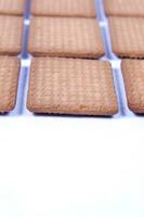 a pile of biscuits on a white background photo