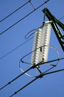 a close up of a power line with wires attached photo