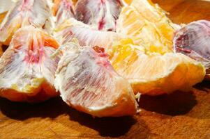 a table with a bunch of oranges on it photo