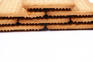 a pile of biscuits on a white background photo