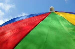 a close up of a colorful umbrella photo