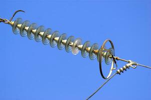 a close up of a power line with wires attached photo