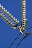 a close up of a power line with wires attached photo