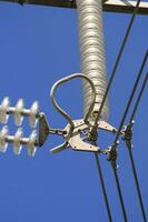 a close up of a power line with wires attached photo