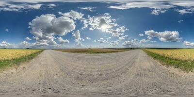 360 hdri panorama on white sand gravel road with clouds on blue sky in equirectangular spherical  seamless projection, skydome replacement in drone panoramas and game development or VR content photo