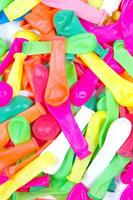 a pile of colorful plastic balloons photo