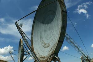 old and large disused radio antennas photo