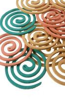 a group of colorful coasters with a spiral design photo