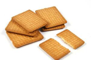 a group of biscuits on a white surface photo