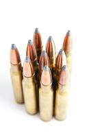 a row of bullet cartridges on a white background photo