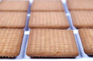 a pile of biscuits on a white background photo