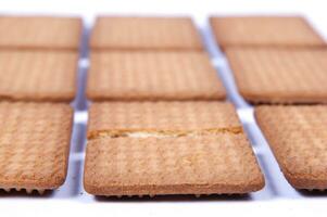 a pile of biscuits on a white background photo
