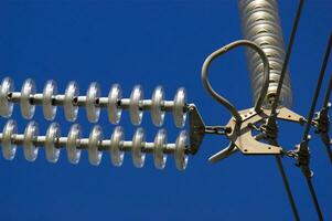 a close up of a power line with wires attached photo