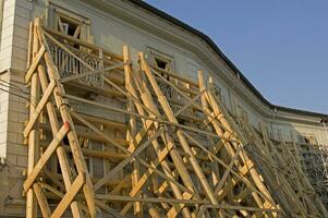 a wooden structure is being built photo