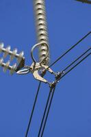 a close up of a power line with wires attached photo