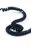 a black cord with a white background photo