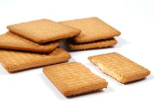 a pile of biscuits on a white background photo