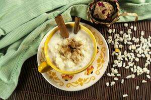 cup of canjica, typical food consumed in the Brazilian Festa Juninas photo