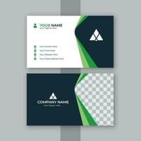 Double-sided creative business card template with black and green color vector