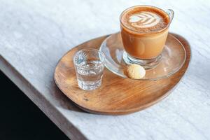 Refreshing hot cup of coffee at a cafe photo