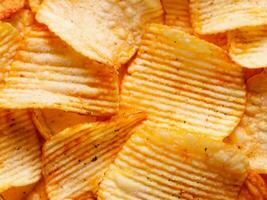 close up fried potato chips background photo