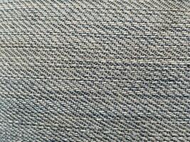 gray fabric background. texture of the textile material. photo