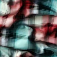 Softly blurred tartan plaid fabric background with subtle artistic color variations photo