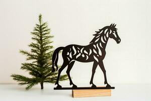 Equestrian themed minimalist Christmas gifts for horse owners isolated on a white background photo