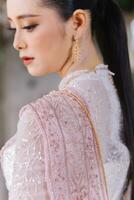 Beautiful Thai girl in Thai traditional costume.Bride Thai girl Beautiful. photo