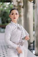 Beautiful Thai girl in Thai traditional costume.Bride Thai girl Beautiful. photo