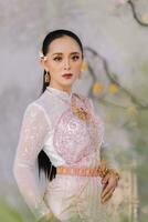 Beautiful Thai girl in Thai traditional costume.Bride Thai girl Beautiful. photo