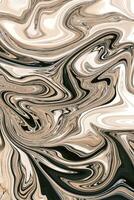 An abstract, background with a fluid, marble-like pattern in predominantly black, white, and beige colors photo