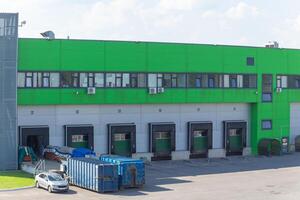 Row of loading docks with shutter doors. photo