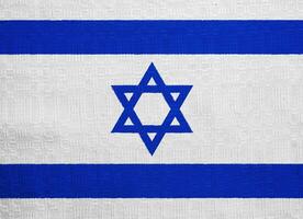 Flag of Israel on a textured background. Concept collage. photo