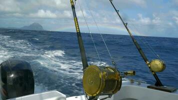 Fishing rods on sailing motor boat video