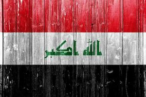 Flag of Republic of Iraq on a textured background. Concept collage. photo