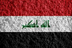 Flag of Republic of Iraq on a textured background. Concept collage. photo