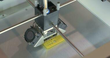 3D printer prints a school ruler video