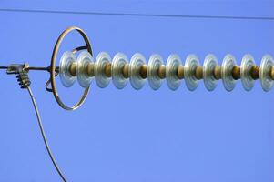 a close up of a power line with wires attached photo