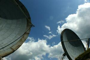 old and large disused radio antennas photo